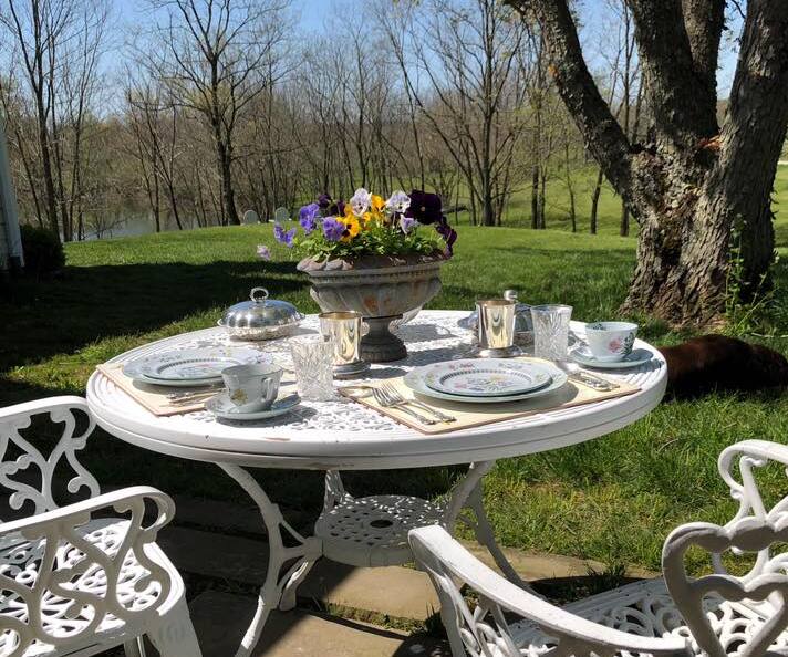 Porch table set for lunch